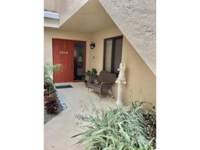 FROM THE MOMENT YOU WALK INTO THIS FULLY UPDATED 2 BED/2 BATH on Bocaire Country Club in Florida - for sale on GolfHomes.com, golf home, golf lot