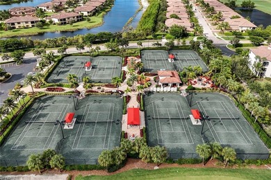 Welcome to this stunning coach home in the highly sought-after on Bonita National Golf Course in Florida - for sale on GolfHomes.com, golf home, golf lot