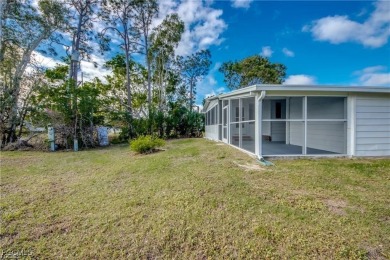 Remodeled with a new roof, new garage for golf cart, and a on Lake Fairways Country Club in Florida - for sale on GolfHomes.com, golf home, golf lot