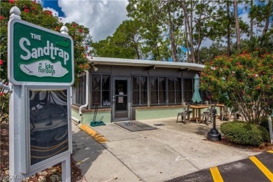 Remodeled with a new roof, new garage for golf cart, and a on Lake Fairways Country Club in Florida - for sale on GolfHomes.com, golf home, golf lot