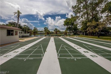 Remodeled with a new roof, new garage for golf cart, and a on Lake Fairways Country Club in Florida - for sale on GolfHomes.com, golf home, golf lot
