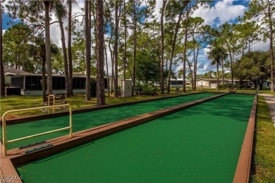 Remodeled with a new roof, new garage for golf cart, and a on Lake Fairways Country Club in Florida - for sale on GolfHomes.com, golf home, golf lot