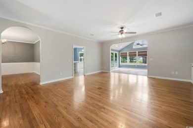 Welcome to this stunning 4-bedroom home nestled in the heart of on Wedgefield Plantation Golf Club in South Carolina - for sale on GolfHomes.com, golf home, golf lot