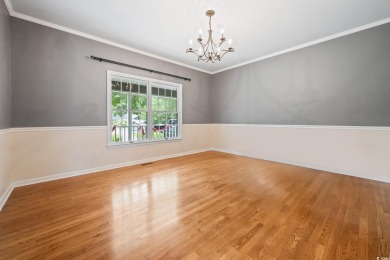 Welcome to this stunning 4-bedroom home nestled in the heart of on Wedgefield Plantation Golf Club in South Carolina - for sale on GolfHomes.com, golf home, golf lot