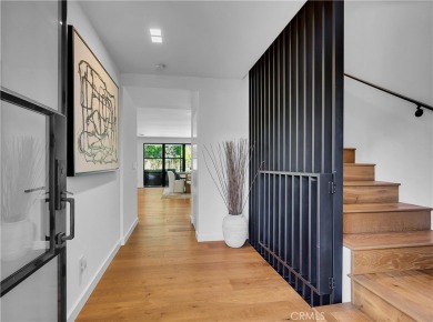 Stunning reimagined contemporary styled home with sleek clean on El Niguel Country Club in California - for sale on GolfHomes.com, golf home, golf lot