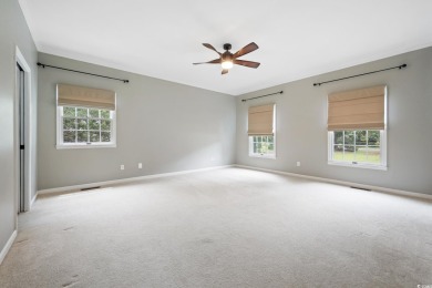 Welcome to this stunning 4-bedroom home nestled in the heart of on Wedgefield Plantation Golf Club in South Carolina - for sale on GolfHomes.com, golf home, golf lot
