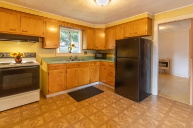 Classic simplicity best describes this single-level ranch home on Country View Golf Club in Maine - for sale on GolfHomes.com, golf home, golf lot