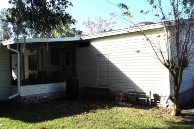 Escape to tranquility in this charming 2-bedroom PH home. With a on Schalamar Creek Golf and Country Club in Florida - for sale on GolfHomes.com, golf home, golf lot