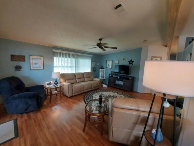 This Charming 2 Bedroom 2 Bath is Move In Ready and comes on Lakes at Leesburg Golf Course in Florida - for sale on GolfHomes.com, golf home, golf lot