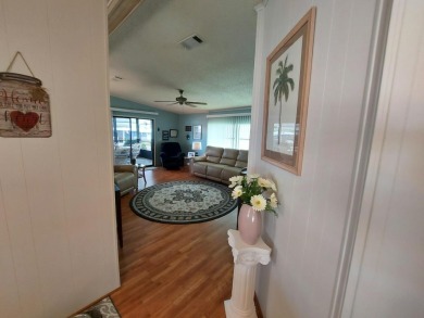 This Charming 2 Bedroom 2 Bath is Move In Ready and comes on Lakes at Leesburg Golf Course in Florida - for sale on GolfHomes.com, golf home, golf lot