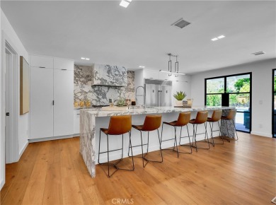 Stunning reimagined contemporary styled home with sleek clean on El Niguel Country Club in California - for sale on GolfHomes.com, golf home, golf lot