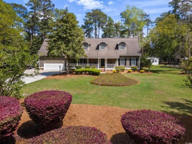 Welcome to this stunning 4-bedroom home nestled in the heart of on Wedgefield Plantation Golf Club in South Carolina - for sale on GolfHomes.com, golf home, golf lot