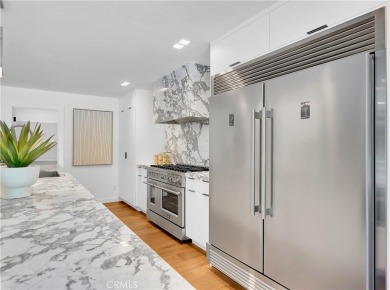 Stunning reimagined contemporary styled home with sleek clean on El Niguel Country Club in California - for sale on GolfHomes.com, golf home, golf lot