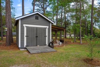 Welcome to this stunning 4-bedroom home nestled in the heart of on Wedgefield Plantation Golf Club in South Carolina - for sale on GolfHomes.com, golf home, golf lot