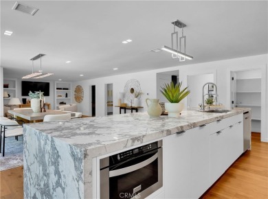 Stunning reimagined contemporary styled home with sleek clean on El Niguel Country Club in California - for sale on GolfHomes.com, golf home, golf lot