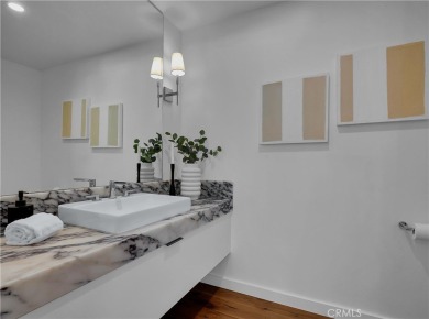 Stunning reimagined contemporary styled home with sleek clean on El Niguel Country Club in California - for sale on GolfHomes.com, golf home, golf lot
