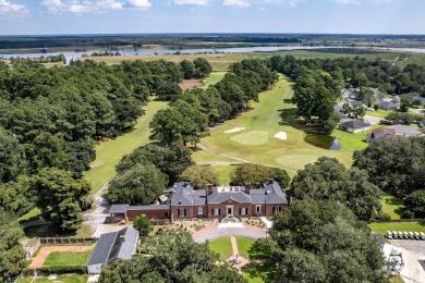 Welcome to this stunning 4-bedroom home nestled in the heart of on Wedgefield Plantation Golf Club in South Carolina - for sale on GolfHomes.com, golf home, golf lot