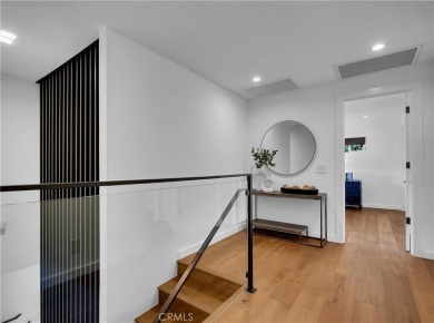 Stunning reimagined contemporary styled home with sleek clean on El Niguel Country Club in California - for sale on GolfHomes.com, golf home, golf lot