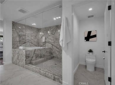 Stunning reimagined contemporary styled home with sleek clean on El Niguel Country Club in California - for sale on GolfHomes.com, golf home, golf lot