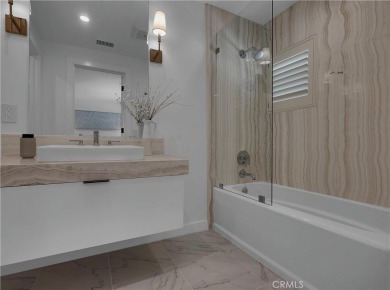 Stunning reimagined contemporary styled home with sleek clean on El Niguel Country Club in California - for sale on GolfHomes.com, golf home, golf lot