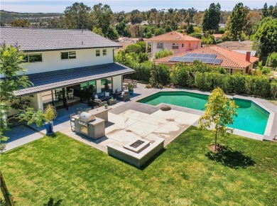 Stunning reimagined contemporary styled home with sleek clean on El Niguel Country Club in California - for sale on GolfHomes.com, golf home, golf lot