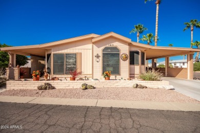 This meticulously maintained corner-lot manufactured home offers on Apache Creek Golf Club in Arizona - for sale on GolfHomes.com, golf home, golf lot