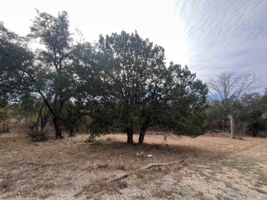 Enjoy the peaceful living of the Hill Country on this .41 acre on Ram Rock Golf Course in Texas - for sale on GolfHomes.com, golf home, golf lot