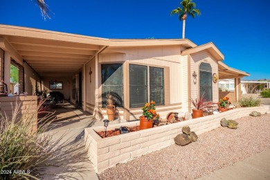 This meticulously maintained corner-lot manufactured home offers on Apache Creek Golf Club in Arizona - for sale on GolfHomes.com, golf home, golf lot