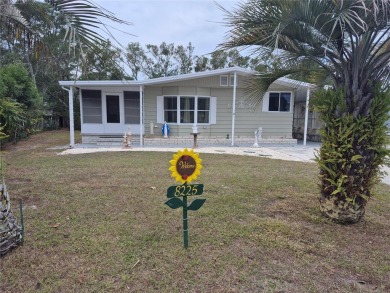 REDUCED PRICE. This home, built by Palm Harbor Homes is located on Brookridge Country Club in Florida - for sale on GolfHomes.com, golf home, golf lot