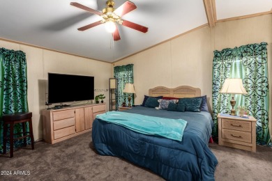 This meticulously maintained corner-lot manufactured home offers on Apache Creek Golf Club in Arizona - for sale on GolfHomes.com, golf home, golf lot