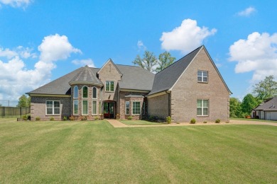 Discover the luxury of 7696 Rowlett Drive, Olive Branch. Built on Cherokee Valley Golf Course in Mississippi - for sale on GolfHomes.com, golf home, golf lot