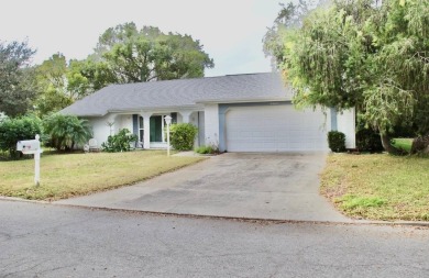 Under contract-accepting backup offers. Welcome to this spacious on Beacon Woods Golf Club in Florida - for sale on GolfHomes.com, golf home, golf lot