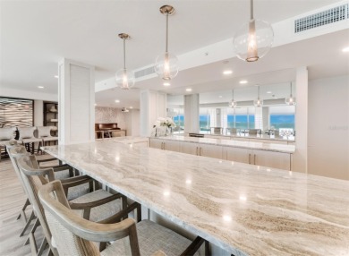 This inviting residence at the Islander Club of Longboat Key on Links on Longboat Golf Club in Florida - for sale on GolfHomes.com, golf home, golf lot