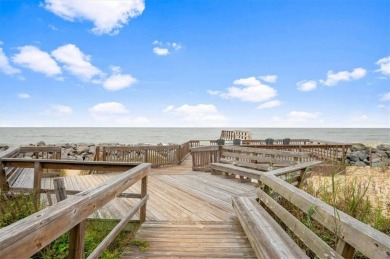 Discover coastal living at its finest in this beautifully custom on Jekyll Island Golf Club in Georgia - for sale on GolfHomes.com, golf home, golf lot