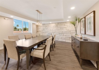 This inviting residence at the Islander Club of Longboat Key on Links on Longboat Golf Club in Florida - for sale on GolfHomes.com, golf home, golf lot