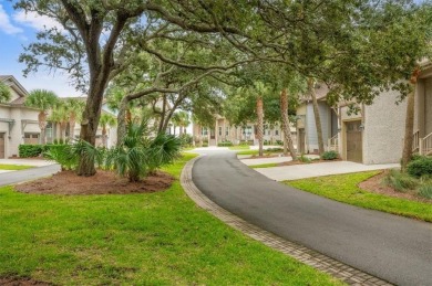 Discover coastal living at its finest in this beautifully custom on Jekyll Island Golf Club in Georgia - for sale on GolfHomes.com, golf home, golf lot