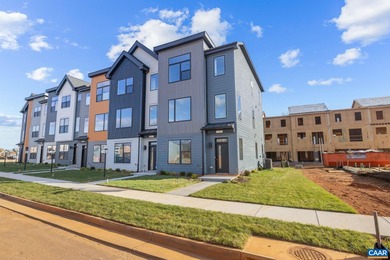 Completed home. Actually photos. The Avon is a modern end-unit on Old Trail Golf Club in Virginia - for sale on GolfHomes.com, golf home, golf lot