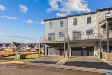 Completed home. Actually photos. The Avon is a modern end-unit on Old Trail Golf Club in Virginia - for sale on GolfHomes.com, golf home, golf lot