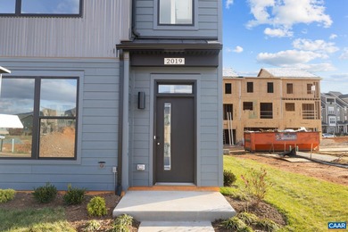 Completed home. Actually photos. The Avon is a modern end-unit on Old Trail Golf Club in Virginia - for sale on GolfHomes.com, golf home, golf lot