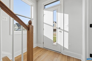 Completed home. Actually photos. The Avon is a modern end-unit on Old Trail Golf Club in Virginia - for sale on GolfHomes.com, golf home, golf lot