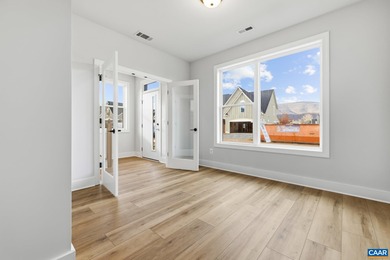 Completed home. Actually photos. The Avon is a modern end-unit on Old Trail Golf Club in Virginia - for sale on GolfHomes.com, golf home, golf lot