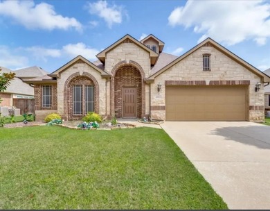 Located in the desirable Garden Heights community, this home on Mansfield National Golf Club in Texas - for sale on GolfHomes.com, golf home, golf lot