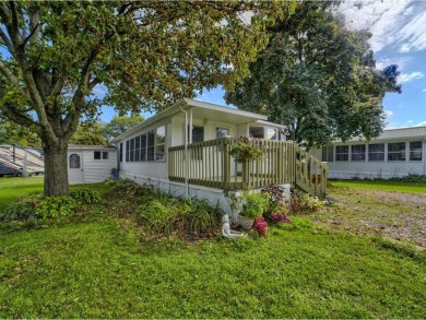 This charming, 1-bedroom seasonal cottage is nestled in the on Apple Island Golf Course At Apple Island Resort in Vermont - for sale on GolfHomes.com, golf home, golf lot