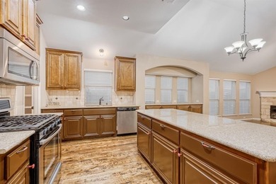 Located in the desirable Garden Heights community, this home on Mansfield National Golf Club in Texas - for sale on GolfHomes.com, golf home, golf lot