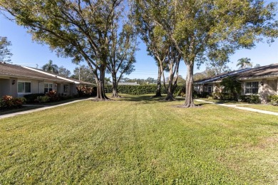 This charming Highland Lakes villa is a sanctuary of natural on Highland Lakes Executive Golf Course in Florida - for sale on GolfHomes.com, golf home, golf lot