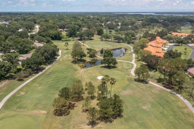 This charming Highland Lakes villa is a sanctuary of natural on Highland Lakes Executive Golf Course in Florida - for sale on GolfHomes.com, golf home, golf lot