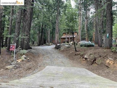 Private Snowshoe Springs Cabin on a nice size 18,295 lot. In on Sequoia Woods Country Club in California - for sale on GolfHomes.com, golf home, golf lot