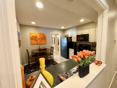Welcome to 49 E Via Roma, a refined 2-bedroom, 3-bath townhome on Crestview Country Club in Kansas - for sale on GolfHomes.com, golf home, golf lot