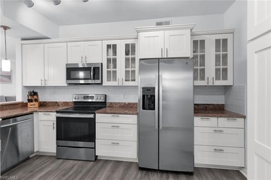 Paradise awaits you with this spacious, light and bright on Hammock Bay in Florida - for sale on GolfHomes.com, golf home, golf lot