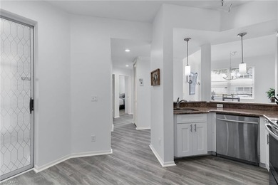 Paradise awaits you with this spacious, light and bright on Hammock Bay in Florida - for sale on GolfHomes.com, golf home, golf lot